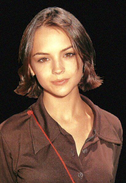 rachael with a brown dress